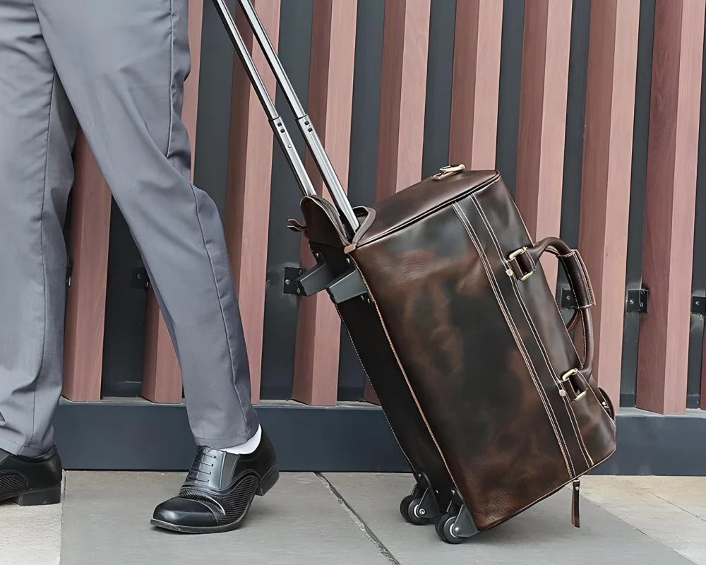 leather carry on bag wheels